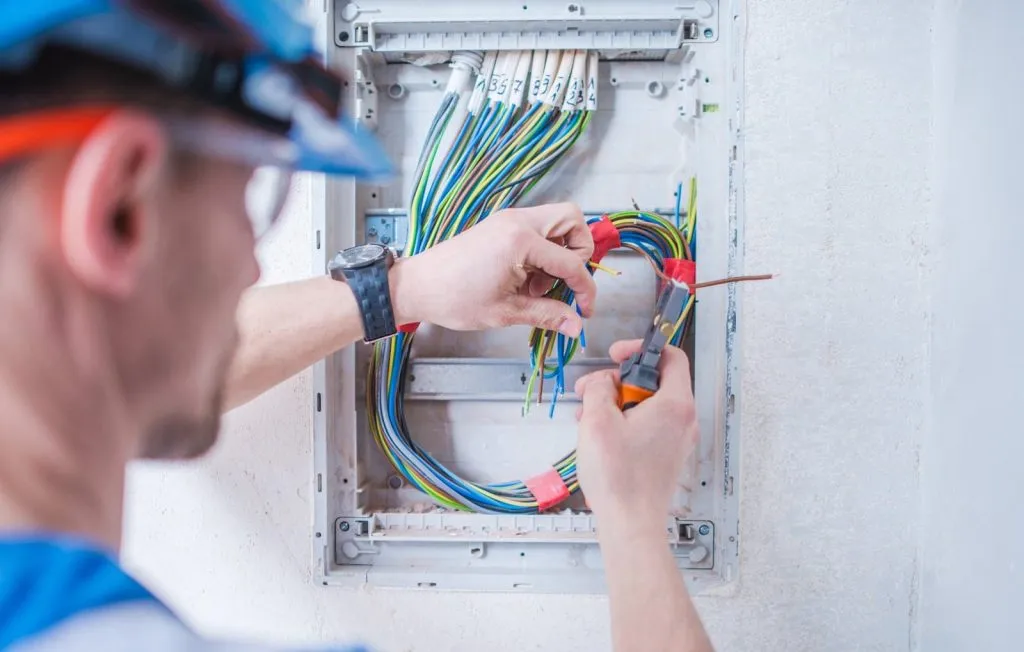 Electrician working on residential panel